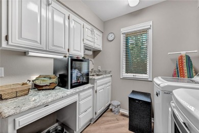 Enjoy breath taking views, from your 24x12 enclosed sunroom, of on Bella Vista Country Club - Scottsdale in Arkansas - for sale on GolfHomes.com, golf home, golf lot
