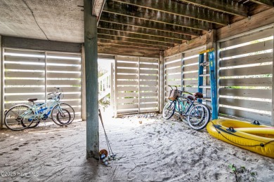 With azure seascapes out almost every window, this four-bedroom on Bald Head Island Golf Club in North Carolina - for sale on GolfHomes.com, golf home, golf lot