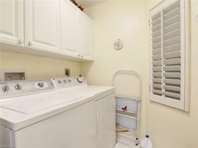 3bd 2 ba end unit condo, with a beautiful lake view. Condo has on Club at Pelican Bay Golf Course in Florida - for sale on GolfHomes.com, golf home, golf lot