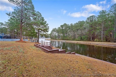 Embrace the beauty of Lake life in this charming 3 bedroom,2 on Carolina Lakes Country Club in North Carolina - for sale on GolfHomes.com, golf home, golf lot