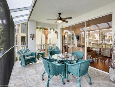 3bd 2 ba end unit condo, with a beautiful lake view. Condo has on Club at Pelican Bay Golf Course in Florida - for sale on GolfHomes.com, golf home, golf lot