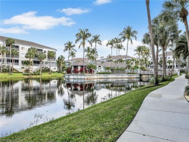 3bd 2 ba end unit condo, with a beautiful lake view. Condo has on Club at Pelican Bay Golf Course in Florida - for sale on GolfHomes.com, golf home, golf lot
