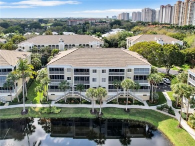 3bd 2 ba end unit condo, with a beautiful lake view. Condo has on Club at Pelican Bay Golf Course in Florida - for sale on GolfHomes.com, golf home, golf lot