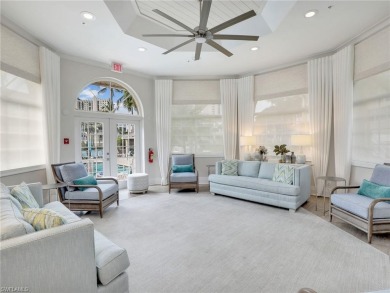3bd 2 ba end unit condo, with a beautiful lake view. Condo has on Club at Pelican Bay Golf Course in Florida - for sale on GolfHomes.com, golf home, golf lot