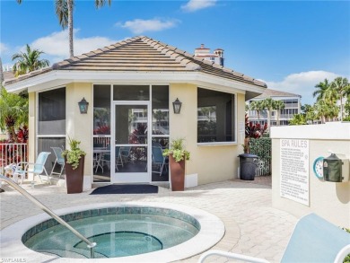 3bd 2 ba end unit condo, with a beautiful lake view. Condo has on Club at Pelican Bay Golf Course in Florida - for sale on GolfHomes.com, golf home, golf lot