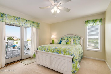 With azure seascapes out almost every window, this four-bedroom on Bald Head Island Golf Club in North Carolina - for sale on GolfHomes.com, golf home, golf lot