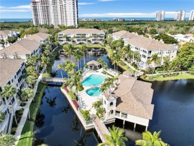 3bd 2 ba end unit condo, with a beautiful lake view. Condo has on Club at Pelican Bay Golf Course in Florida - for sale on GolfHomes.com, golf home, golf lot