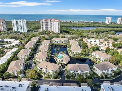 3bd 2 ba end unit condo, with a beautiful lake view. Condo has on Club at Pelican Bay Golf Course in Florida - for sale on GolfHomes.com, golf home, golf lot