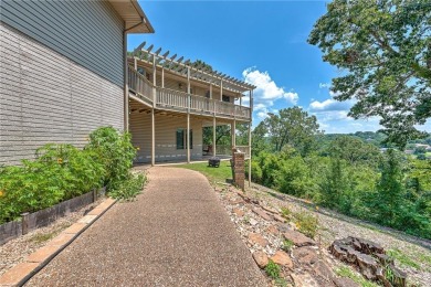 Enjoy breath taking views, from your 24x12 enclosed sunroom, of on Bella Vista Country Club - Scottsdale in Arkansas - for sale on GolfHomes.com, golf home, golf lot