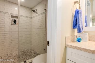 With azure seascapes out almost every window, this four-bedroom on Bald Head Island Golf Club in North Carolina - for sale on GolfHomes.com, golf home, golf lot
