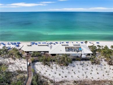 3bd 2 ba end unit condo, with a beautiful lake view. Condo has on Club at Pelican Bay Golf Course in Florida - for sale on GolfHomes.com, golf home, golf lot