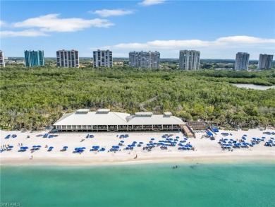 3bd 2 ba end unit condo, with a beautiful lake view. Condo has on Club at Pelican Bay Golf Course in Florida - for sale on GolfHomes.com, golf home, golf lot