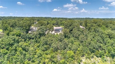 Enjoy breath taking views, from your 24x12 enclosed sunroom, of on Bella Vista Country Club - Scottsdale in Arkansas - for sale on GolfHomes.com, golf home, golf lot