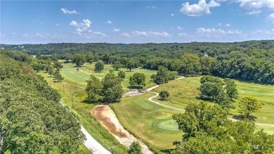 Enjoy breath taking views, from your 24x12 enclosed sunroom, of on Bella Vista Country Club - Scottsdale in Arkansas - for sale on GolfHomes.com, golf home, golf lot