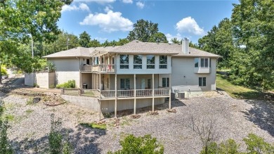 Enjoy breath taking views, from your 24x12 enclosed sunroom, of on Bella Vista Country Club - Scottsdale in Arkansas - for sale on GolfHomes.com, golf home, golf lot