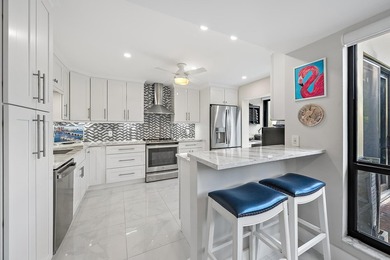 Desirable 1st floor 3-bedroom, 2-bath residence with tranquil on Quail Ridge Golf Course and Country Club in Florida - for sale on GolfHomes.com, golf home, golf lot