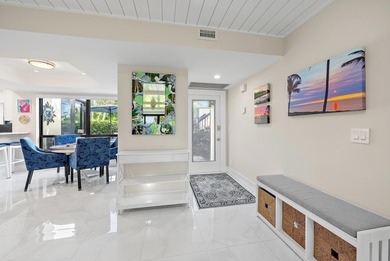 Desirable 1st floor 3-bedroom, 2-bath residence with tranquil on Quail Ridge Golf Course and Country Club in Florida - for sale on GolfHomes.com, golf home, golf lot