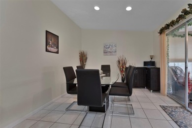 Charming two bedroom/2 bath home in the very popular retirement on Highland Fairways Golf Club in Florida - for sale on GolfHomes.com, golf home, golf lot