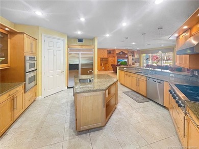 Crane Creek Fortress - Step inside this stunning CBS sanctuary on Martin Downs Country Club in Florida - for sale on GolfHomes.com, golf home, golf lot