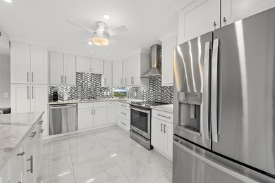 Desirable 1st floor 3-bedroom, 2-bath residence with tranquil on Quail Ridge Golf Course and Country Club in Florida - for sale on GolfHomes.com, golf home, golf lot