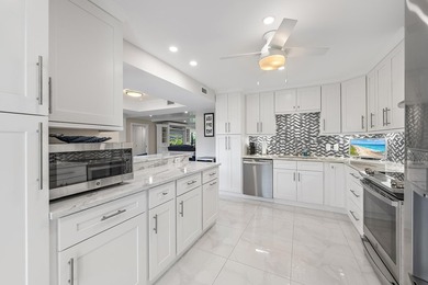 Desirable 1st floor 3-bedroom, 2-bath residence with tranquil on Quail Ridge Golf Course and Country Club in Florida - for sale on GolfHomes.com, golf home, golf lot