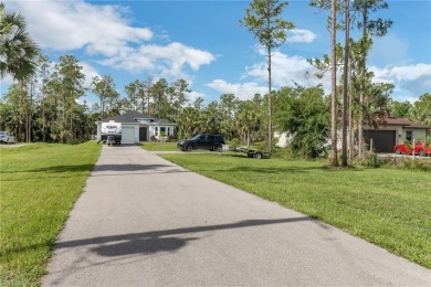 Welcome to your dream home in Golden Gate Estates! This on The Club At Twin Eagles in Florida - for sale on GolfHomes.com, golf home, golf lot