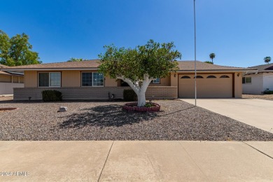 Enjoy the best of active adult living in this charming 3-bedroom on Sun City Country Club in Arizona - for sale on GolfHomes.com, golf home, golf lot