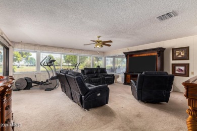 Enjoy the best of active adult living in this charming 3-bedroom on Sun City Country Club in Arizona - for sale on GolfHomes.com, golf home, golf lot