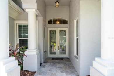 Located in the prestigious, manned and guard-gated community of on Hunters Green Country Club in Florida - for sale on GolfHomes.com, golf home, golf lot