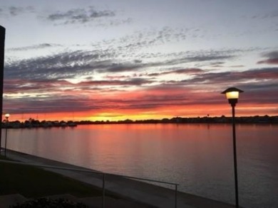 What a view from your private balcony....spectacular sunsets & on Oak Harbor Golf Club in Louisiana - for sale on GolfHomes.com, golf home, golf lot