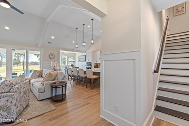 This open and airy home with golf and pond views is ready for a on Sea Trail Golf Resort in North Carolina - for sale on GolfHomes.com, golf home, golf lot