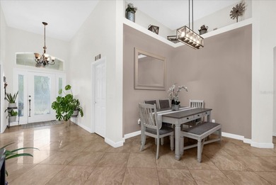 Experience golf course living at its finest in this beautifully on Hunters Creek Golf Course in Florida - for sale on GolfHomes.com, golf home, golf lot