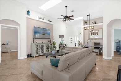 Experience golf course living at its finest in this beautifully on Hunters Creek Golf Course in Florida - for sale on GolfHomes.com, golf home, golf lot