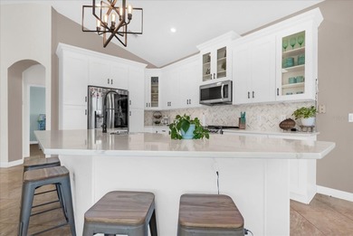 Experience golf course living at its finest in this beautifully on Hunters Creek Golf Course in Florida - for sale on GolfHomes.com, golf home, golf lot