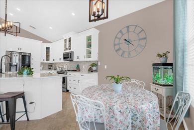 Experience golf course living at its finest in this beautifully on Hunters Creek Golf Course in Florida - for sale on GolfHomes.com, golf home, golf lot