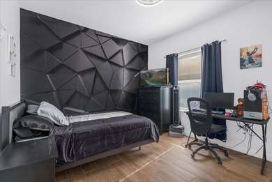 Experience golf course living at its finest in this beautifully on Hunters Creek Golf Course in Florida - for sale on GolfHomes.com, golf home, golf lot