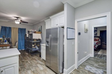 Discover this well-maintained 3-bedroom, 2-bathroom home in the on Lake Caroline Golf Club in Mississippi - for sale on GolfHomes.com, golf home, golf lot