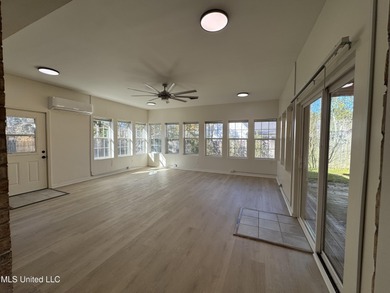 Welcome home to this recently updated 3-bedroom, 2-bath brick on Diamondhead Country Club in Mississippi - for sale on GolfHomes.com, golf home, golf lot