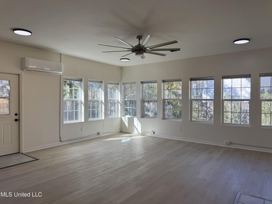 Welcome home to this recently updated 3-bedroom, 2-bath brick on Diamondhead Country Club in Mississippi - for sale on GolfHomes.com, golf home, golf lot