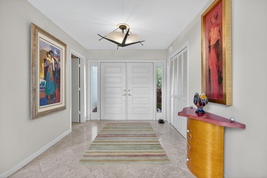 A spectaculate view awaits you as you enter this bright, airy on Eastpointe Country Club in Florida - for sale on GolfHomes.com, golf home, golf lot
