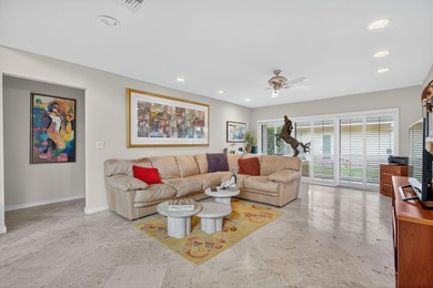 A spectaculate view awaits you as you enter this bright, airy on Eastpointe Country Club in Florida - for sale on GolfHomes.com, golf home, golf lot