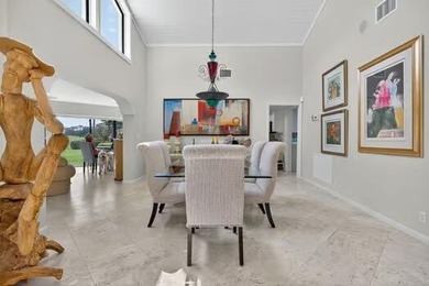 A spectaculate view awaits you as you enter this bright, airy on Eastpointe Country Club in Florida - for sale on GolfHomes.com, golf home, golf lot