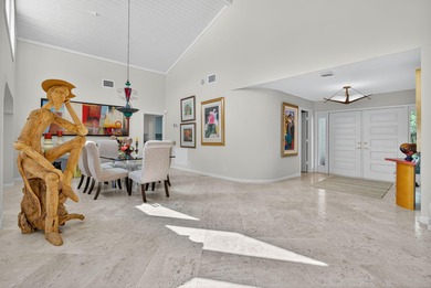 A spectaculate view awaits you as you enter this bright, airy on Eastpointe Country Club in Florida - for sale on GolfHomes.com, golf home, golf lot