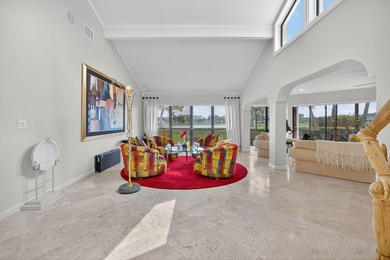 A spectaculate view awaits you as you enter this bright, airy on Eastpointe Country Club in Florida - for sale on GolfHomes.com, golf home, golf lot