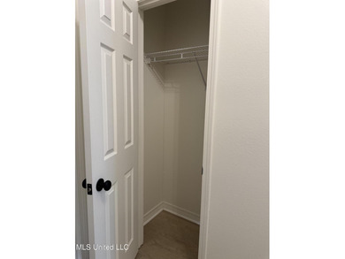 Welcome home to this recently updated 3-bedroom, 2-bath brick on Diamondhead Country Club in Mississippi - for sale on GolfHomes.com, golf home, golf lot