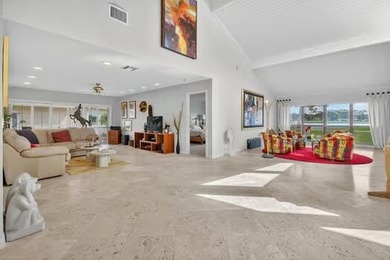 A spectaculate view awaits you as you enter this bright, airy on Eastpointe Country Club in Florida - for sale on GolfHomes.com, golf home, golf lot