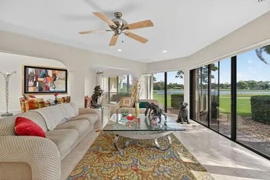 A spectaculate view awaits you as you enter this bright, airy on Eastpointe Country Club in Florida - for sale on GolfHomes.com, golf home, golf lot