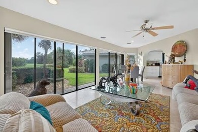 A spectaculate view awaits you as you enter this bright, airy on Eastpointe Country Club in Florida - for sale on GolfHomes.com, golf home, golf lot