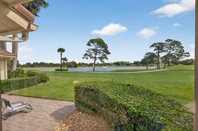 A spectaculate view awaits you as you enter this bright, airy on Eastpointe Country Club in Florida - for sale on GolfHomes.com, golf home, golf lot