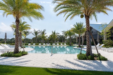 A spectaculate view awaits you as you enter this bright, airy on Eastpointe Country Club in Florida - for sale on GolfHomes.com, golf home, golf lot
